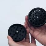 Black grinder showing grinding teeth